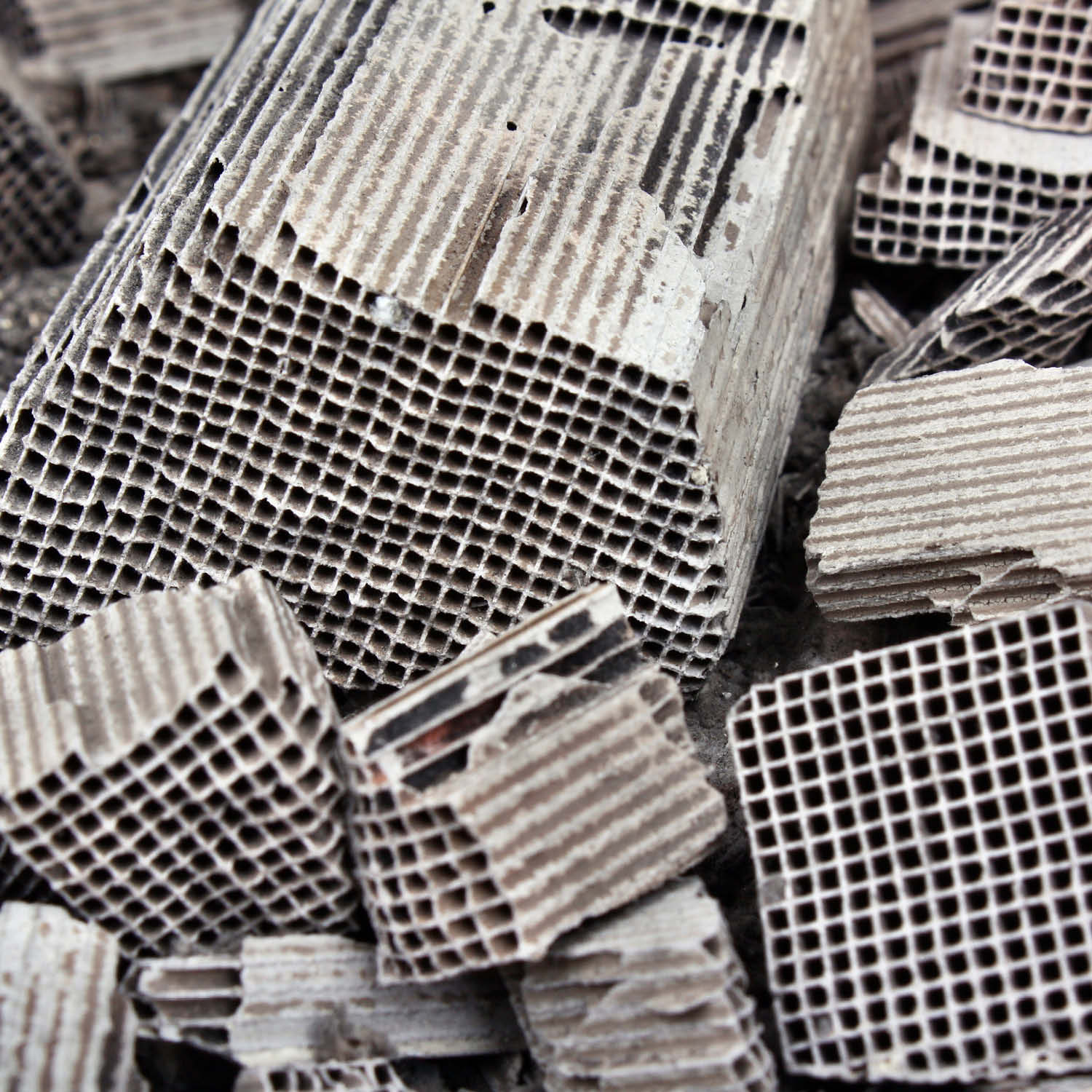 Used catalytic converters. EDXRF provides elemental analysis for precious metal recovery operations.