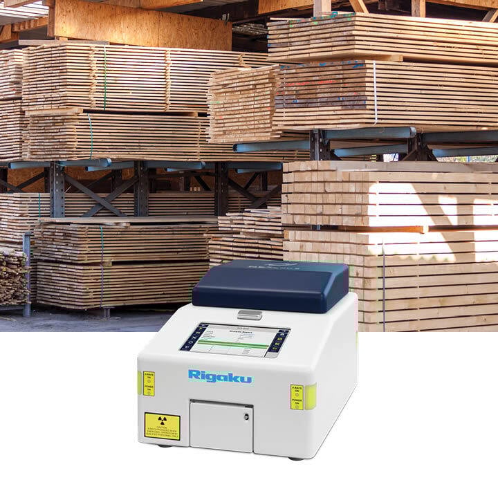 Treated lumber with NEX QC II EDXRF elemental analyzer used for AWPA A9 standards.