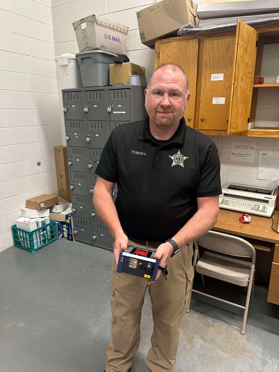 CS1b_Captain Travis Turner from the Washington County Sheriffs Department in Virginia holds Rigakus CQL Narc-ID handheld detector_