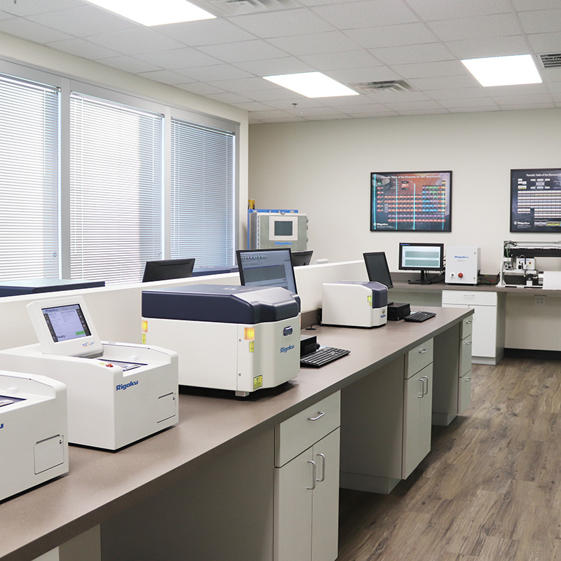 Rigaku EDXRF benchtops in lab at Applied Rigaku Technologies.